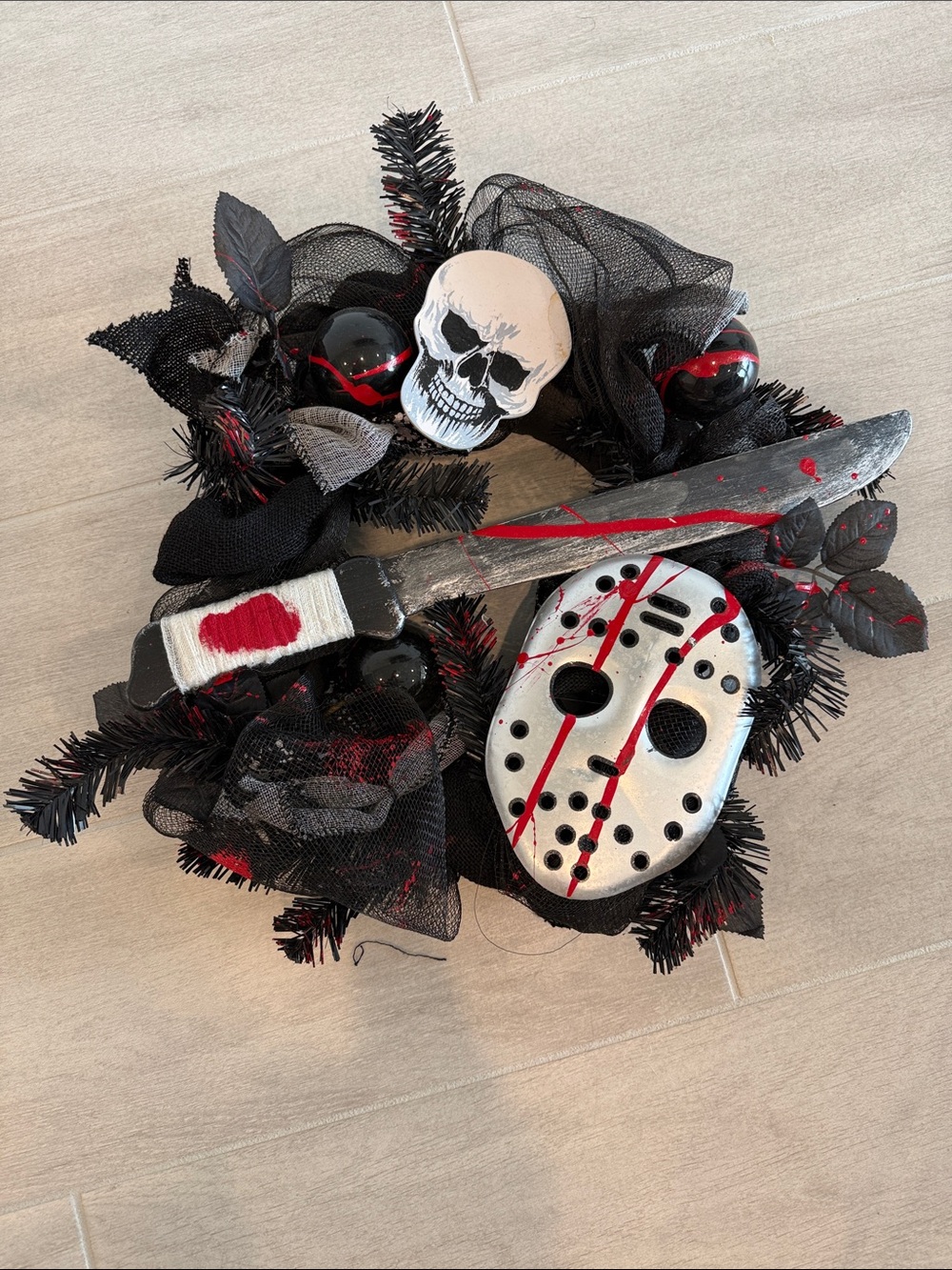 Halloween Horror Wreath featuring Jason’s Friday the 13th mask and knife